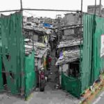 BRICS Summit Makeover Delhi Slums Hidden Behind Curtains